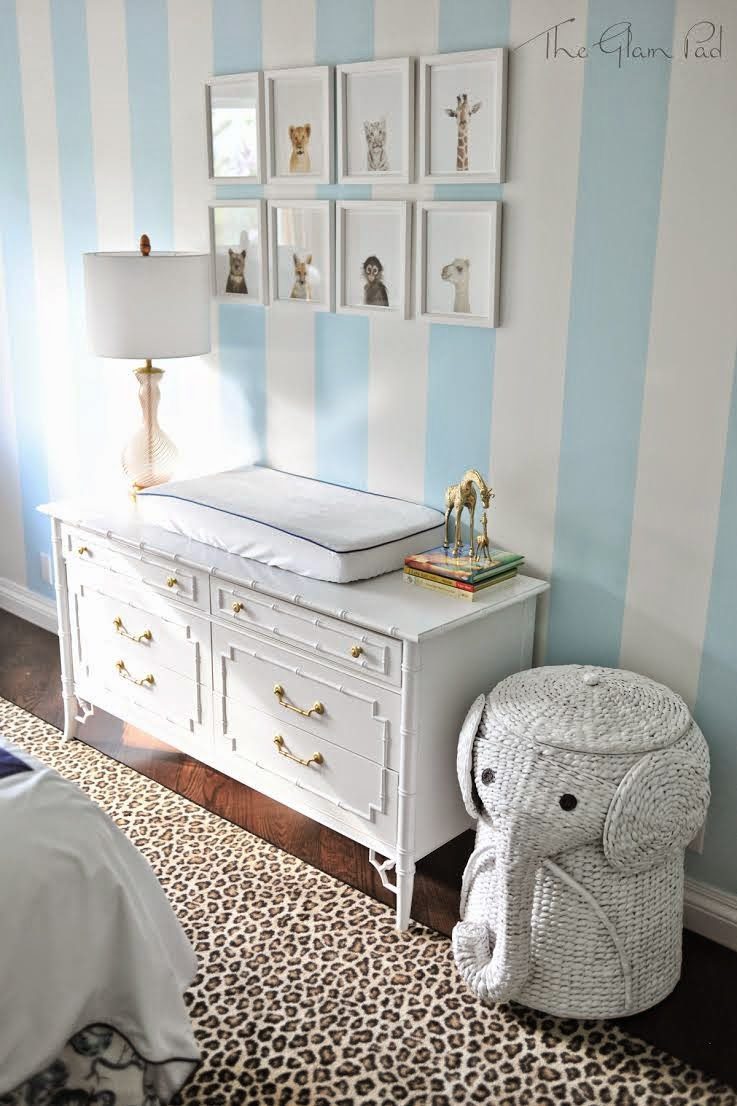 faux-bamboo-dresser-changing-table-vintage-thomasville-the-animal-print-shop-murano-lamp-elephant-hamper-wicker-leopard-rug-blue-and-white-striped-nursery  - The Glam Pad
