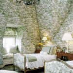 green-and-white-toile-ensconced-bedroom-upholstered-walls