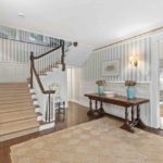 blue-and-white-striped-wall-paper-sisal-rug-entryway