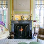 Coverstory_Patricia-Altschul_fireplace-leopard-chair