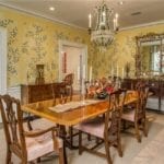 yellow-chinoiserie-dining-room-sisal-carpet-chippendale-chairs-mahogany-furniture