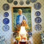 blue-white-plates-on-wall-portrait