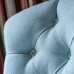 maltese-cross-tufting-detail-chair-linen