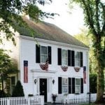 red-white-blue-home-flags-white-picket-fence-saltbox