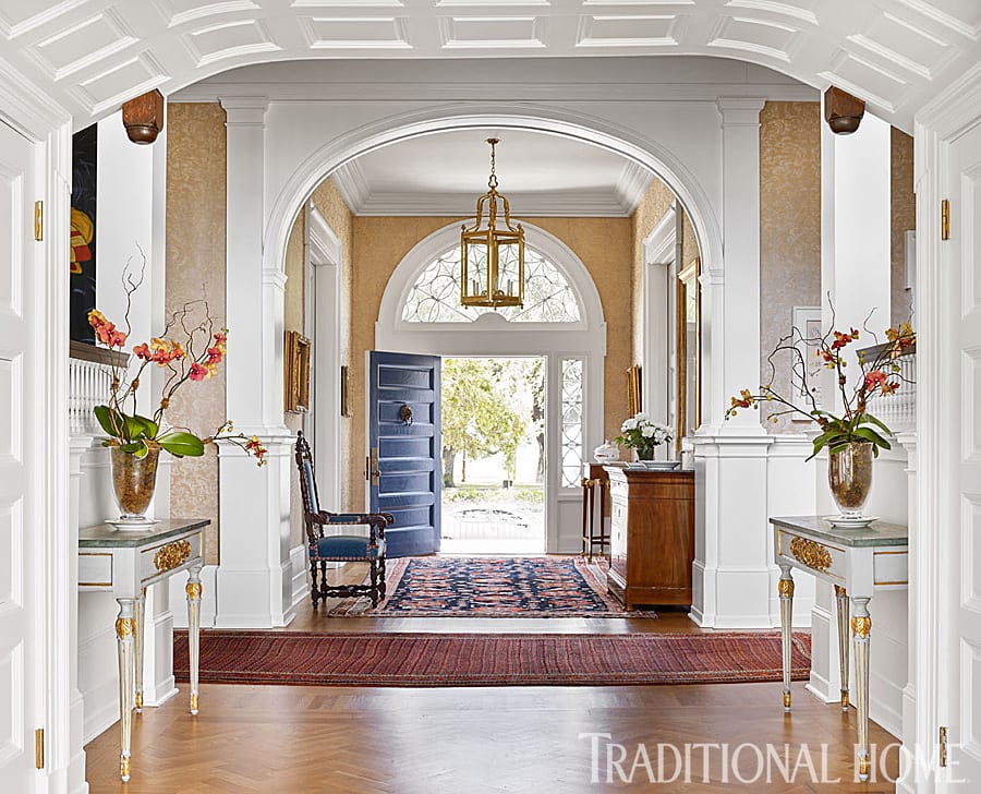 traditional-entryway-persian-rug-hardwood-floors-herringbone-antiques - The  Glam Pad