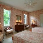 upholstered-walls-peach-toile-classic-bedroom