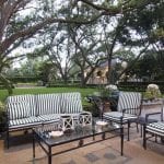 black-white-stripes-patio-furniture-regency-style-houston-river-oaks-back-yard