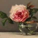 Rose in glass and gold bowl