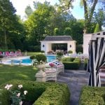 pink-blue-white-landscaped-backyard-pool-boxwood-parterre