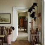 glenlohane-hats-hanging-on-antlers-antique-english-walking-sticks-antiques-persian-rug
