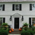 pretty-pink-tulips-fall-decorated-house-pumpkins-window-boxes-colonial-traditional