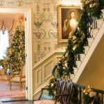 carter-and-company-interior-design-stairs-entryway-foyer-garland-gold-ribbon-christmas-tree-traditional-classic