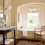 classic-pink-painted-bathroom-marble-tub-chintz-persian-rug
