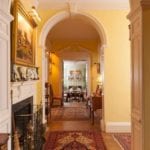 mt-sharon-orange-virginia-hallway-yellow-paint-persian-rugs-fireplace