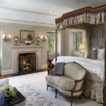 bedroom-canopy-bed-fireplace-crystal-sconces