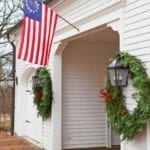 carriage-style-garage-colonial-flag