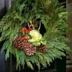 colonial-christmas-wreath-evergreen-pinecones-holly-black-door