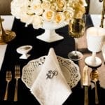 eddie-ross-black-gold-new-years-eve-dinner-table-setting-ideas-milk-glass