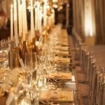 gold-spray-painted-wine-bottles-crystal-glasses-lucite-gold-flatware-table-tablescape-christmas-new-years-eve-wedding-celebration