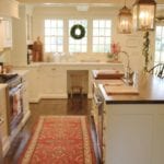 jenny-steffens-hobick-kitchen-persian-oriental-rug-woodbock-wooden-cabinets-countertops-classic-white-christmas-wreat-window
