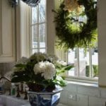 the-enchanted-home-blog-blue-white-chinoiserie-planter-greenery-wreath-bow-christmas-kitchen