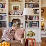 book-shelf-styling-james-farmer-interior-design-family-room-velvet-sofa-plate-collection