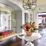 celerie-kemble-entryway-fronmental-wallpaper-tropical-flowers-mirrored-wall-visual-comfort-pendant