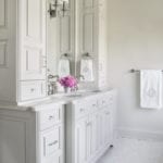custom-vanity-built-ins-mirror-white-marble-bathroom-monogrammed-towels