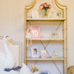 pink-peach-baby-girl-nursery-luxury-porthault-gold-bookcase