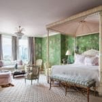 mario-buatta-bedroom-gracie-hand-painted-chinoiserie-wallpaper-d-porthault-linens-canopy-bed-mirrored-night-stands-prince-of-chintz