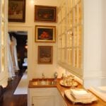 butlers-pantry-wood-countertops-white-cabinets-glass-fronts-traditional-still-life-art-sterling-silver-j-wilson-fuqua
