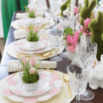 easter-tablescape-decorating-ideas-pink-plates-candy-basket-bunny-rabbits-spring-table