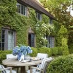 climbing-roses-ivy-covered-house-boxwood-english-style-tudor-architecture