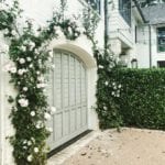 rose-arbor-garage-sage-green-door-arched