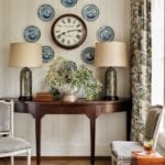 demilune console Theodore Alexander keeping room floral-patterned Jane Shelton Nina Nash Ed Easterling is hand-glazed lamps by Charlie West Lamps