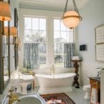 elegant-bathroom-freestanding-bath-tub-sconces-cafe-curtains-persian-rug
