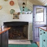 one_kings_lane_jeffreybilhuber_kitchen fireplace