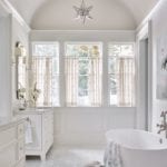 clary-bosbyshell-bathroom-white-marble-d-porthault-towels-cafe-curtains-master-bath-freestanding