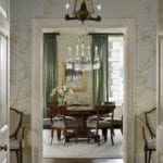 classic-style-mcmillen-interior-design-round-dining-table-crystal-chandelier-murals-hand-painted-chinoiserie-wallpaper