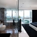 master-bedrooms-ideas-trends-open-concept-bathroom-exposed-toilet-bath-tub-windows-sink