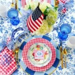 preppy-paper-girl-fourth-of-july-memorial-day-tablescape-gingham-ribbons-bows-gold-gilt-bamboo-flatware-american-flag-hydrangea
