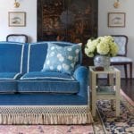 Caroline Gidiere blue and white navy velved sofa scalamandre tassel trim aviary bird prints persian rug japanned cabinet