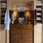 closet modeled after an image of Mark Birley’s dressing room. Irish oak was cerused for the space and custom painted lampshades were done in the Bloomsbury Group taste.