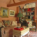 nicky-haslam-hunting-lodge-chintz-chair-persian-rug