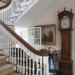 pink ground farrow and ball curved staircase english entrance hall equestrian art long case clock