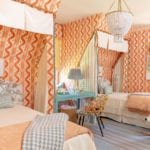 quadrille-bali-hai-wallpaper-orange-girl-room-children-twin-beds-canopy-tester-attic-chandelier