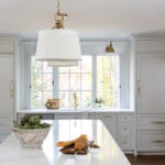 anne-wagoner-interiors-pale-blue-powder-kitchen-classic-traditional-marble-countertops-two-refrigerators-flanking-sink