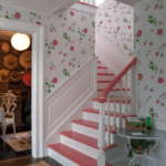 scheerer pink painted stairs floral wallpaper hamptons home