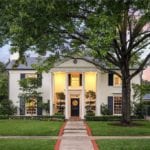 amy-berry-interiors-home-for-sale-beverly-drive-colonial-style-white-painted-brick-black-shutters-pillars-1930s-architecture
