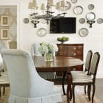 breakfast-room-kitchen-table-mounted-flat-screen-television-tv-plates-surrounding-hanging-on-wall-pewter-platters-traditional-antiques